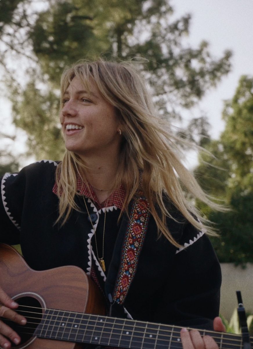 Nikki Falk recording a music video for her album's lead single "June Blue," shot by Meredith Rodgers (Courtesy of Nikki Falk).